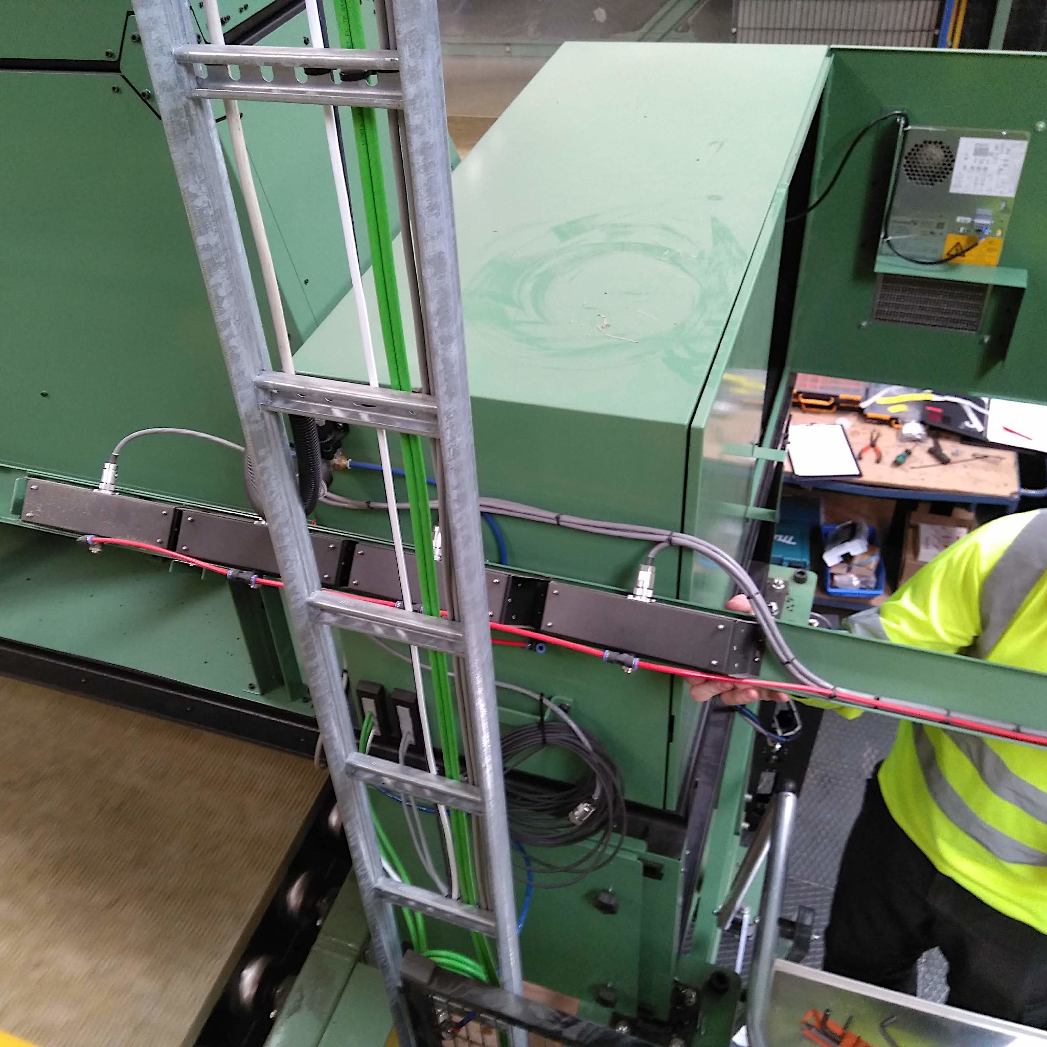 Servicing the lights on a running line